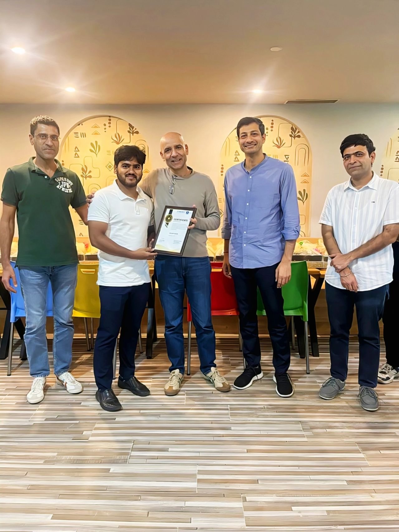 Sk Saifuddin with the Techmagnate and Bajaj Finserv leadership team at the award ceremony